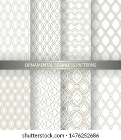Collection of seamless beige gold patterns with geometric waves. Endless stylish texture. Ripple monochrome background. Vector set