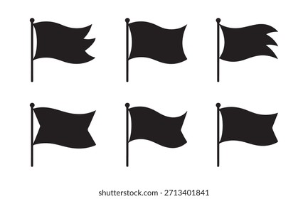 Collection of silhouetted waving flags on poles