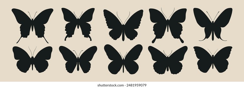 Collection of silhouettes of butterflies of different shapes.