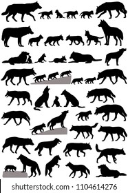 Collection of silhouettes of wolves and wolf-cubs