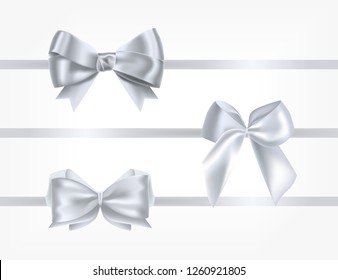 Collection of silk silver ribbons decorated with bows. Bundle of glossy decorative design elements. Set of holiday present decorations isolated on white background. Realistic vector illustration.