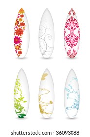 collection of six surfboards with abstract patterns and shadow