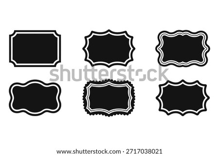 A Collection of Six Unique Black and White Decorative Label Shapes with White Outlines on a Plain Background