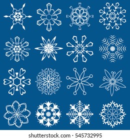 Collection of snowflakes on a blue background.