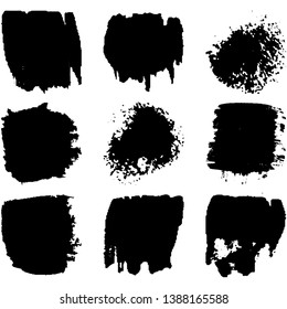 Collection of spots, brush strokes in grunge style. Monochrome abstract blots on white background