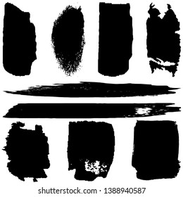 Collection of spots, brush strokes in grunge style. Monochrome abstract blots on white background
