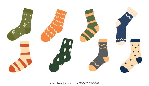 Collection of stylish cotton and wool socks with different patterns, drawings, colors and design. Striped, cute winter footwear. Set of trendy clothing items. Flat vector illustration, isolated.