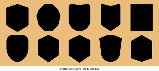 Collection of ten black shield silhouettes on a beige background. Various shield shapes, including square and rounded designs. Perfect for graphic design projects. Element vector set.