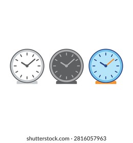 A collection of three simple round desk clocks displayed in white, gray, and blue color variations. These clean timepieces are perfect for modern office decor ideas.