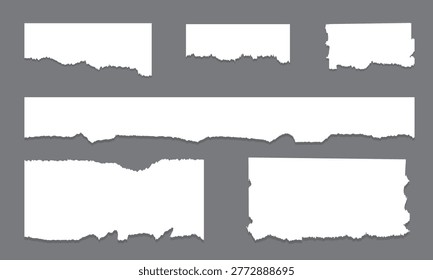 Collection of torn paper shapes with rough edges on gray background for adding text or design elements