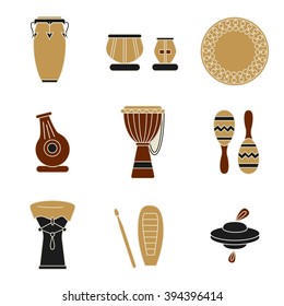 Collection of traditional percussion instruments.Flat icons in black, deep red and pale brown colors.