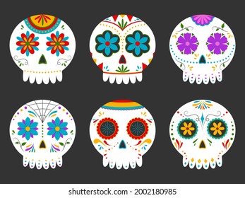 Collection of traditional sugar Mexican skull. Day of the dead skull. Vector illustration isolated on dark background