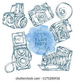 Collection of varios old photo camera .Vector hand drawn illustration.