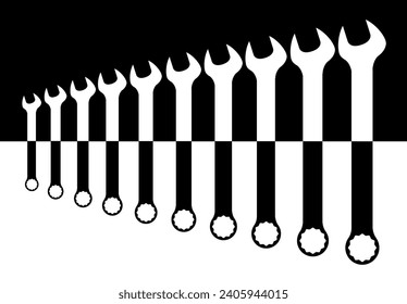 A collection of various sized mechanics spanners in black and white silhouette