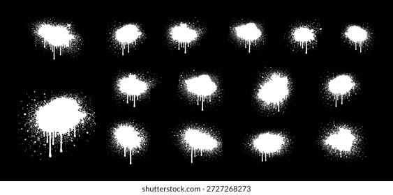 Una colección de varias salpicaduras y gotas de spray blanco sobre un fondo negro sólido, ideal para el arte urbano y los diseños urbanos.
