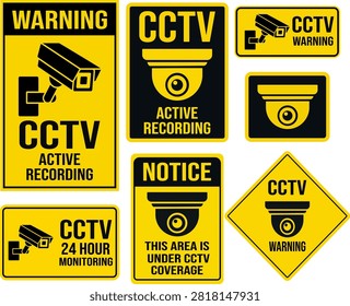 Collection of various yellow and black CCTV surveillance warning and notice signs displayed together