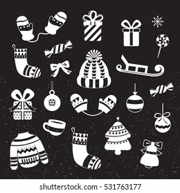 Collection of vector Christmas elements: socks, gifts, cup, mittens, hat, Christmas ball, sled and others. Xmas icons on a dark background. Elements for design greeting cards, patterns, packaging.