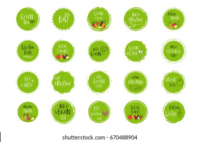 Collection of vector eco, bio green logo or sign. Vegan, raw, healthy food badge, tag for cafe, restaurants, products packaging. Hand drawn leaves, branches with lettering. Organic design.