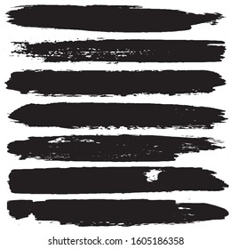Collection of vector grunge brushes. Paint strokes with a dry brush. Abstract ink blots on a white background