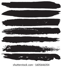 Collection of vector grunge brushes. Paint strokes with a dry brush. Abstract ink blots on a white background