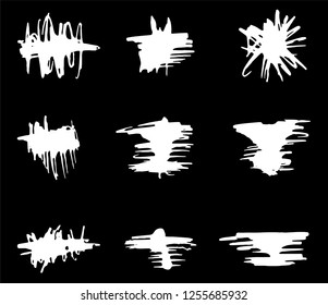 Collection of vector grunge stains, brushes for creating logos, lines and headers. Dirty artistic design elements on black.