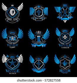 Collection of vector heraldic decorative coat of arms isolated on white and created using vintage design elements, monarch crowns, pentagonal stars, armory, wild animals.