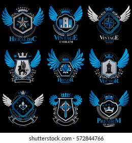 Collection of vector heraldic decorative coat of arms isolated on white and created using vintage design elements, monarch crowns, pentagonal stars, armory, wild animals.
