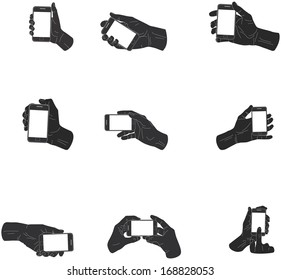 Collection of vector illustration black hands holding smartphone - icons