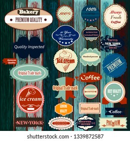 Collection of vector labels in retro style on grunge wooden background