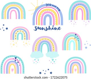 Collection of vector rainbows with text. Rainbow with clouds.