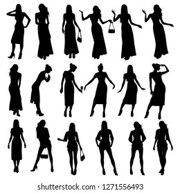 Collection of vector silhouettes of beautiful slim girls isolated on white background. Girls in long dresses with long hair.