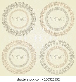 Collection of vintage round frames with a damask wallpaper on a light background