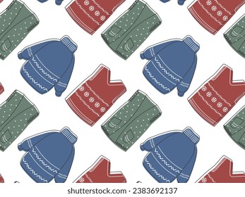 Collection of warm cozy clothes seamless pattern. Vector illustration