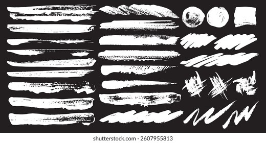 Collection of White Brush Strokes on Black Background