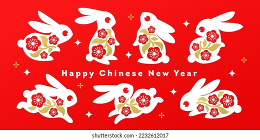 Collection of white bunnies with sakura flowers on a red. Chinese new year 2023 greeting card with lunar zodiac symbol of rabbit for traditional chinas holiday spring festival