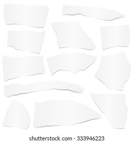 collection of white colored scraps of papers with shadow