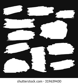 A collection white on a black background grungy abstract hand-painted brush strokes banner. Vector illustration