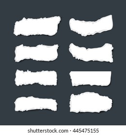Collection of white ripped pieces of paper with rough edges isolated on dark background, realistic vector illustration