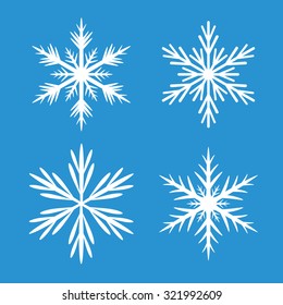 Collection of White Snowflakes and Blue Background.