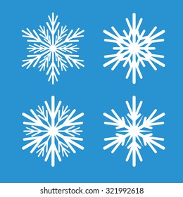 Collection of White Snowflakes and Blue Background.