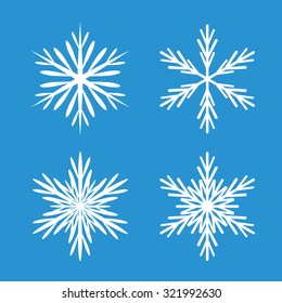 Collection of White Snowflakes and Blue Background.