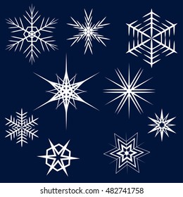 Collection of White Snowflakes on dark blue background