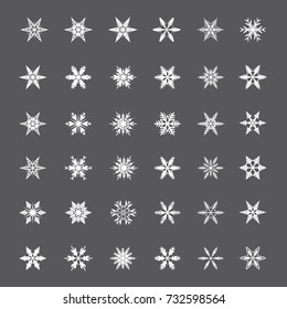 Collection of White Snowflakes on gray background. Vector isolated icons.