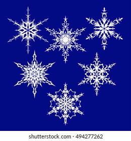 Collection of white vector snowflakes for creation of Christmas and New Year card, background, artistic composition, invitation card. Geometric circle shapes.  Winter objects. Festive elements.
