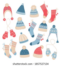 Collection of winter cute accessories - socks, mittens, hats with different ornaments. Trendy season wool clothes for warm walks. Set of knitted garment items. Vector illustration.