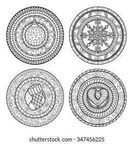 Collection of winter hand drawn mandalas. Ethnic ornaments for adult Christmas coloring book. Doodle pattern with Christmas ball and sock, snowflake and heart. Template black and white background.