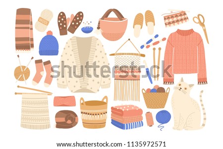 Collection of winter knitted clothes and knitting tools isolated on white background - woolen jumper, cardigan, scarf, hat, mittens, socks, needles, hook, yarn. Flat cartoon vector illustration