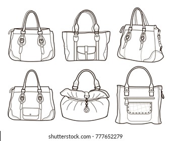 collection of women's handbags isolated on white