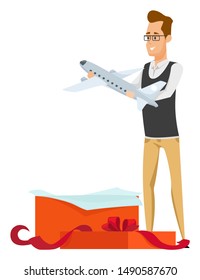 Collector man plane, opening present box. Portrait view of male wearing glasses and casual clothes holding airplane, collecting hobby, tourism vector