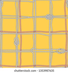 Coloful anf bright Vector Summer Nautical mood Seamless with white  sea ropes and silver chain on a vivid summer yellow background for fashion ,wallpaper ,fabric and all prints 